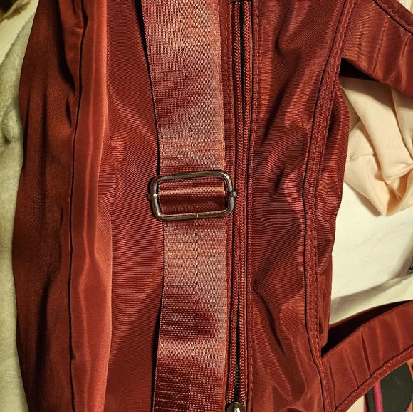 A small shoulder or crossbody purse with a ton of pockets to carry everything! - Picture 11 of 15